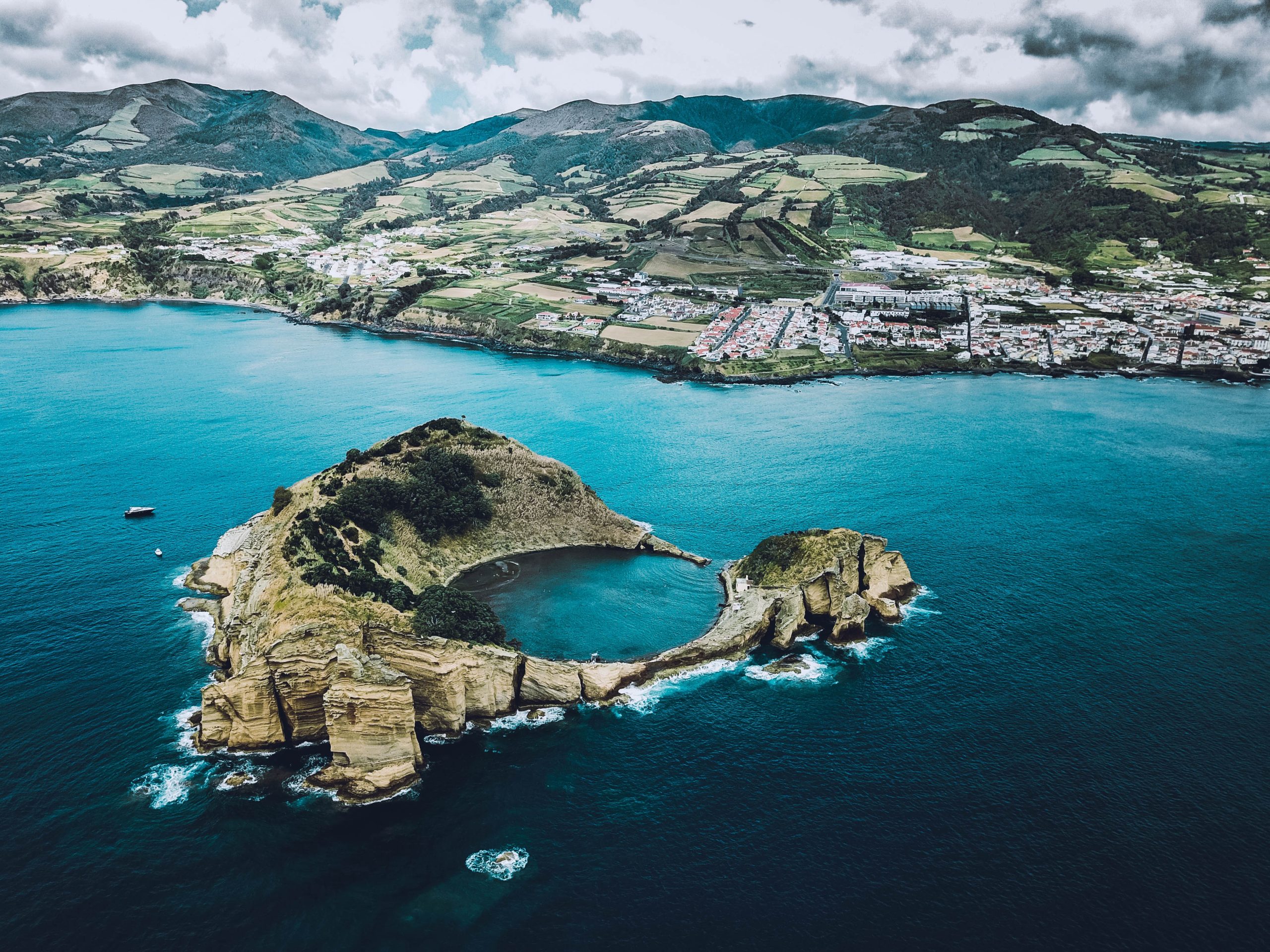 beautiful aerial shot of the sea with mountains